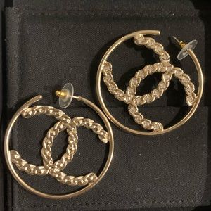 Authentic Chanel REV large crystal and gold hoops earrings.  Excellent condition
